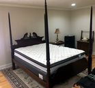 Queen size poster bed, like new mattress