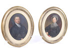 PAIR OF OVAL OIL PORTRAITS