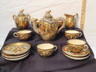 Dragon encrusted tea set