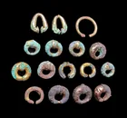  Preview image for 16 Near Eastern Gilt Hair Rings | 