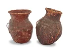  Preview image for Two Apache pitch-covered basketry 