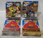  Preview image for Lot# 497 - 4 Hot Wheels Action Packs - T 