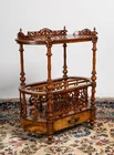  Preview image for A Victorian walnut canterbury, 36 3/4 x 