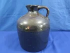  Preview image for Lot# 137 - A 10" Crock Style Jug (Top Sp 