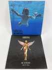  Preview image for 2 Nirvana albums, Nevermind and In Utero 