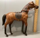  Preview image for Lot# 135b - Leather wrapped horse figure 