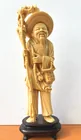  Preview image for CARVED FIGURE OF FISHERMAN ON HARDWOOD 