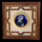  Preview image for 413. Porcelain plaque in leather frame 