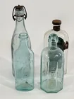  Preview image for Lot# 1 - 4) ANTIQUE ADVERTISING BOTTLES 