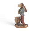  Preview image for POTTERY SCULPTURE OF MAN WITH JUG AND 