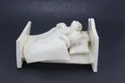  Preview image for SOLVEIG COX WHITE POTTERY FIGURAL BED 