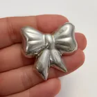  Preview image for STERLING SILVER BOW SHAPE PUFFY BROOCH 