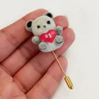  Preview image for WHITE AND GRAY TEDDY BEAR HOLDING #1 