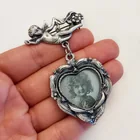  Preview image for PEWTER CHERUB AND DANGLING HEART PHOTO 