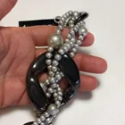  Preview image for VINTAGE SILVER AND BLACK ACRYLIC ROUND 