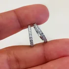  Preview image for SILVER TONE CLEAR CZ HUGGIE HOOP 