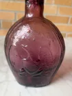  Preview image for Vintage-Style Embossed Glass Bottle 