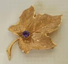  Preview image for DECO 14 KT. YELLOW GOLD/AMETHYST BROOCH, 