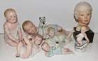 Preview image for PIANO BABIES, 19/20TH C., TALLEST 9 1/2" 