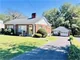 CHARMING BRICK HOUSE WITH 2 GARAGES IN TOWN!