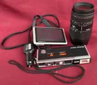  Preview image for Minolta Autopack 450E and Garmin GPS, 